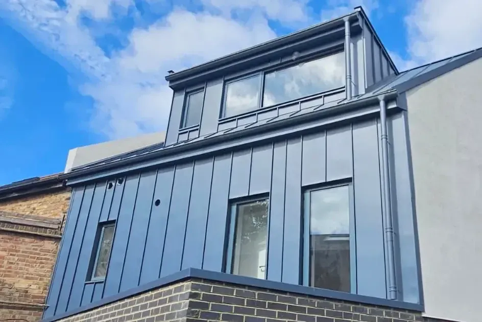 Zinc standing seam roof and wall cladding on a residential loft extension in London